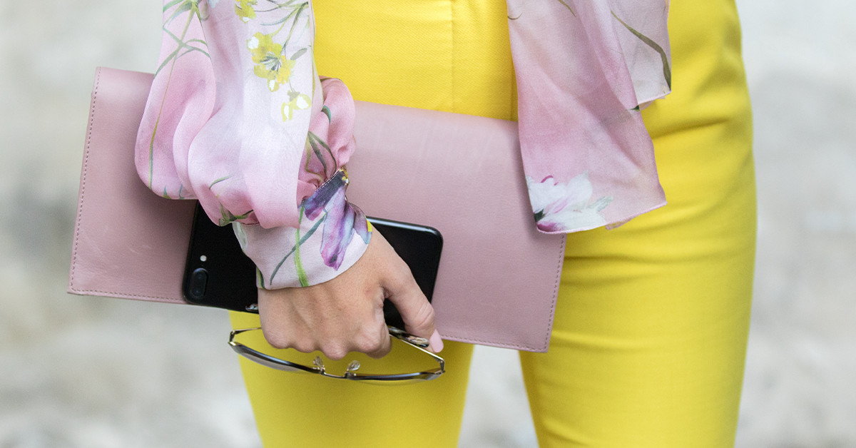Bold yellow satin pants with a flower blouse and a pashmina