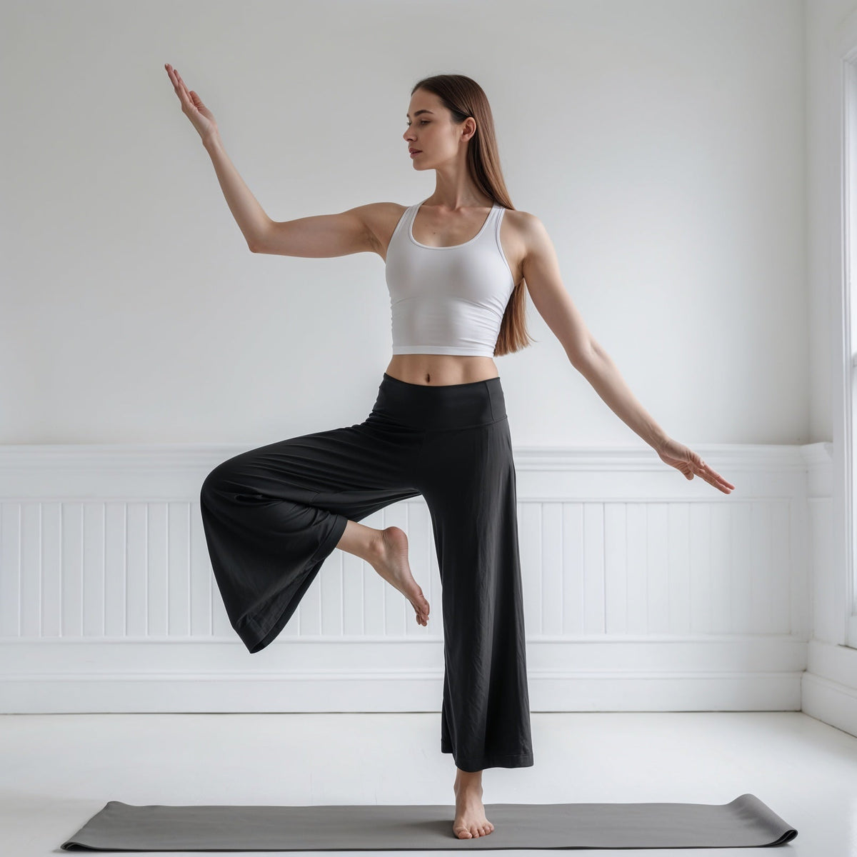 an OP model showing how to style wide-leg yoga pants