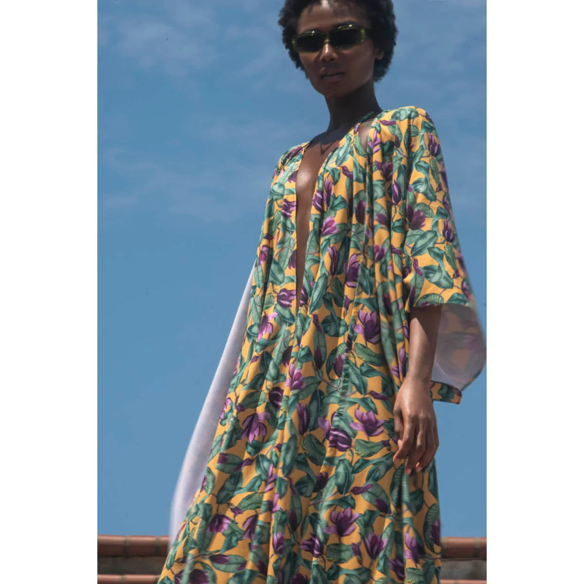 a African American model wearing a kimono this spring season