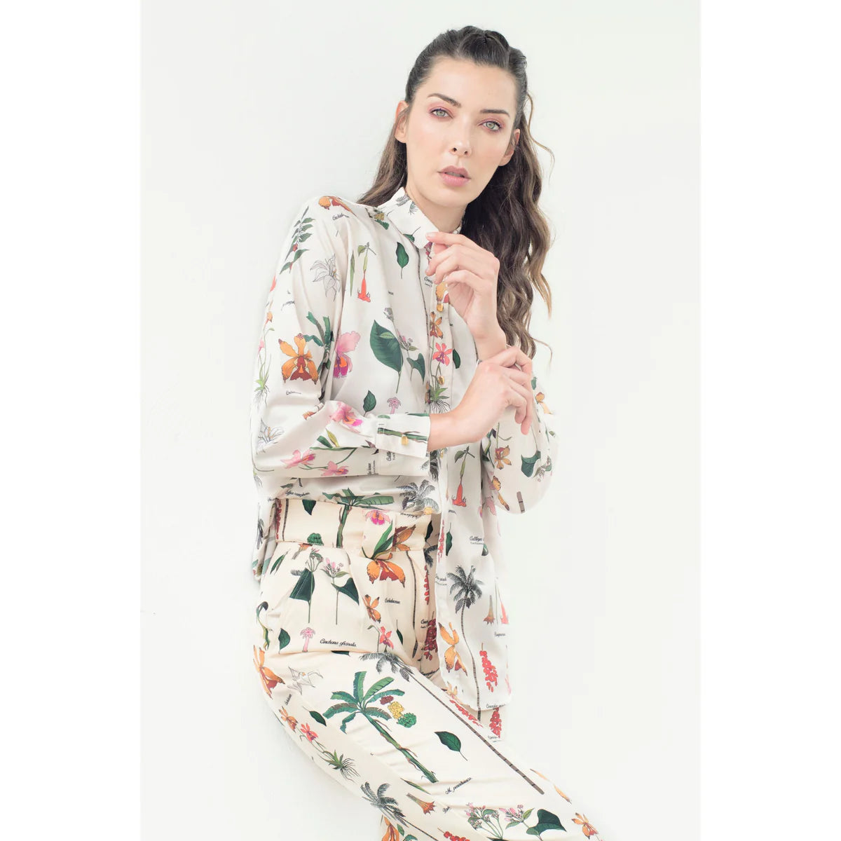 a unisex model going beyond gender with a flower shirt and pants in a cool and fashionable way with OnPost