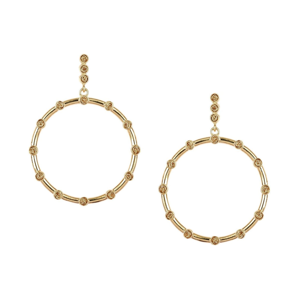 Unique statement gold hoop earrings showcasing a modern silhouette and a touch of artisanal crochet artistry.