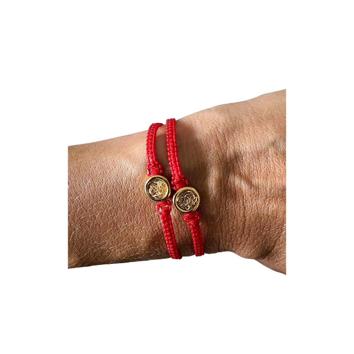 red cord bracelet with gold charm